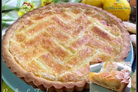 Deliziosa crostata beneventana con un ripieno dorato e una griglia di pasta frolla. Accanto, una fetta servita con panna montata.